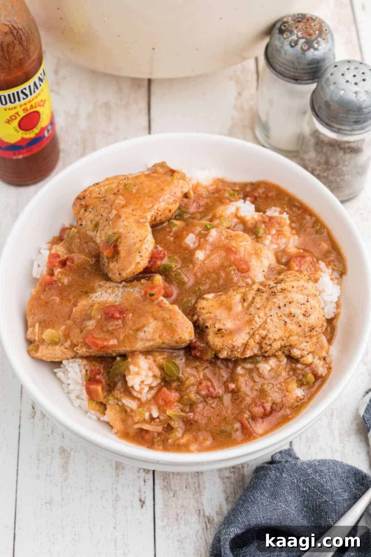 Cajun Catfish Delight 2 Overhead shot of a bowl of catfish courtbouillon over rice.
