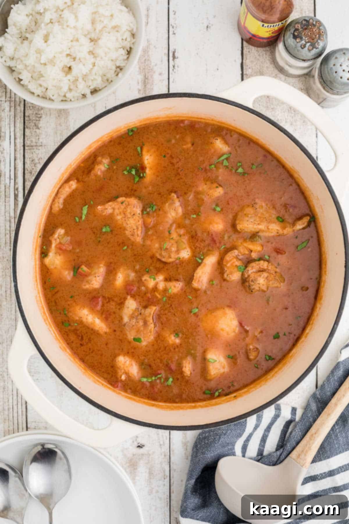 Cajun Catfish Delight 4 Overhead of a Dutch Oven filled with catfish courtbouillon.