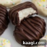 A bite taken out of a buttercream easter egg, revealing the soft filling.