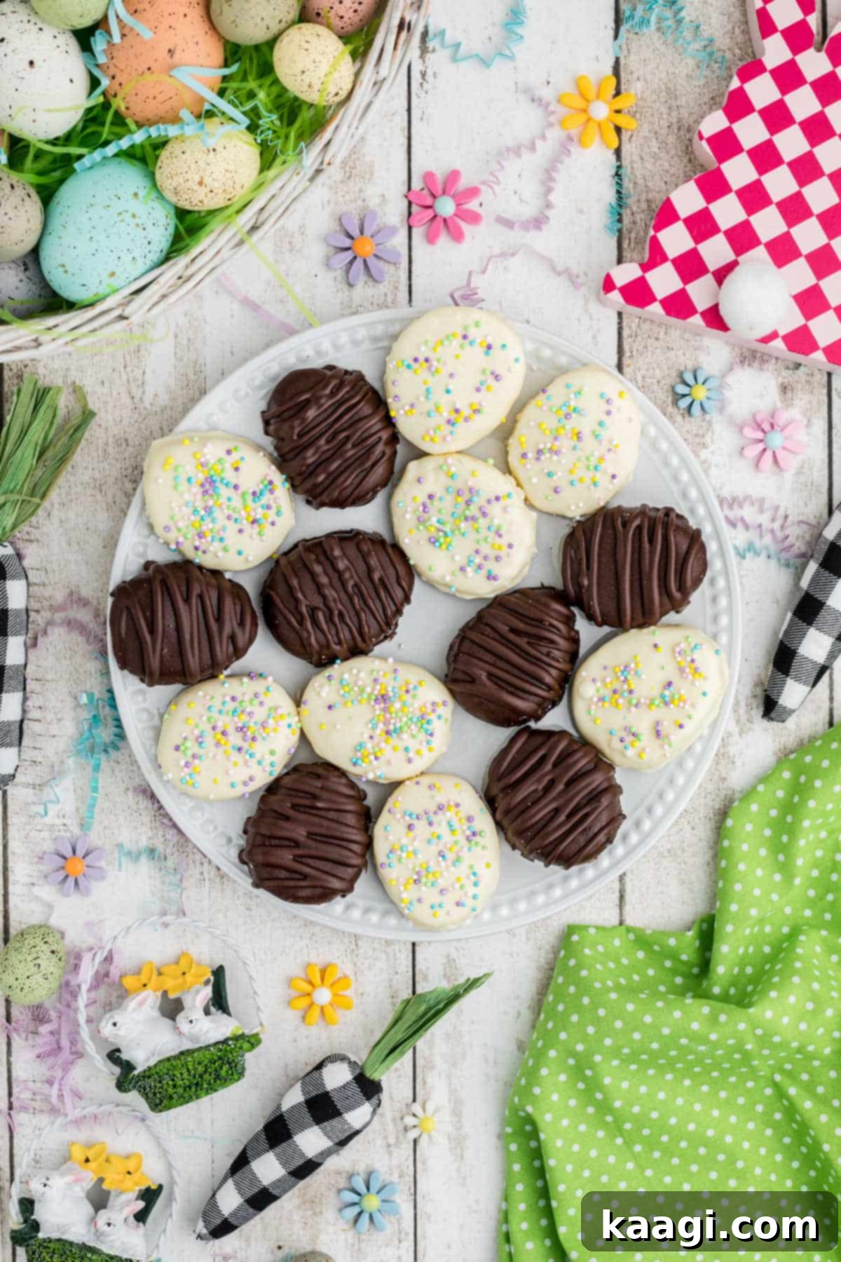 Overhead shot of a plate full of beautifully decorated buttercream easter eggs.