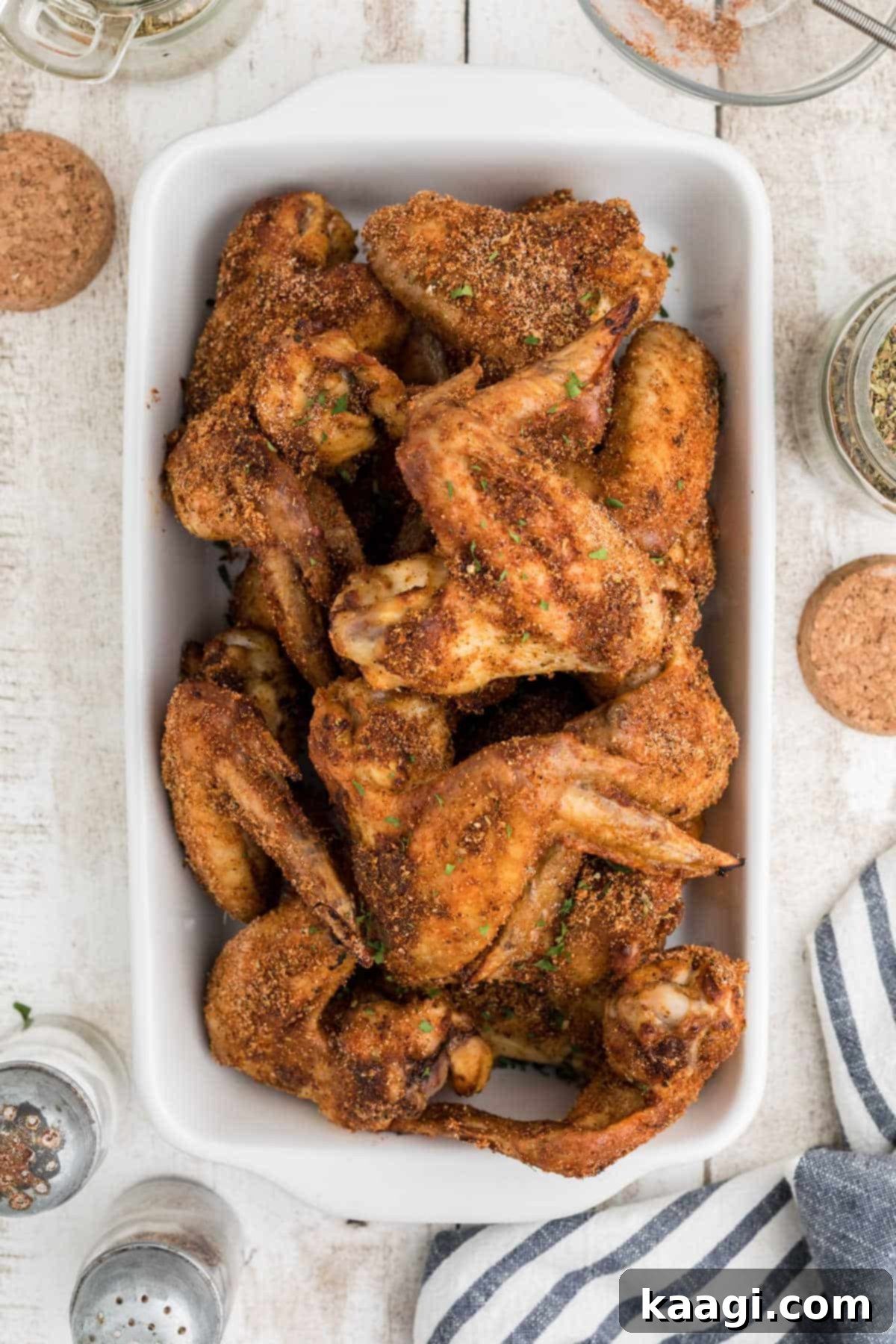 Homemade Wingstop Louisiana Rub 2 Overhead shot of a dish of crispy chicken wings cooked with homemade Wingstop Louisiana Rub.
