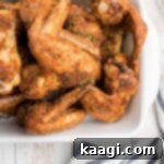 Homemade Wingstop Louisiana Rub 12 Wingstop Louisiana Rub Recipe on some wings cooked and in a dish.