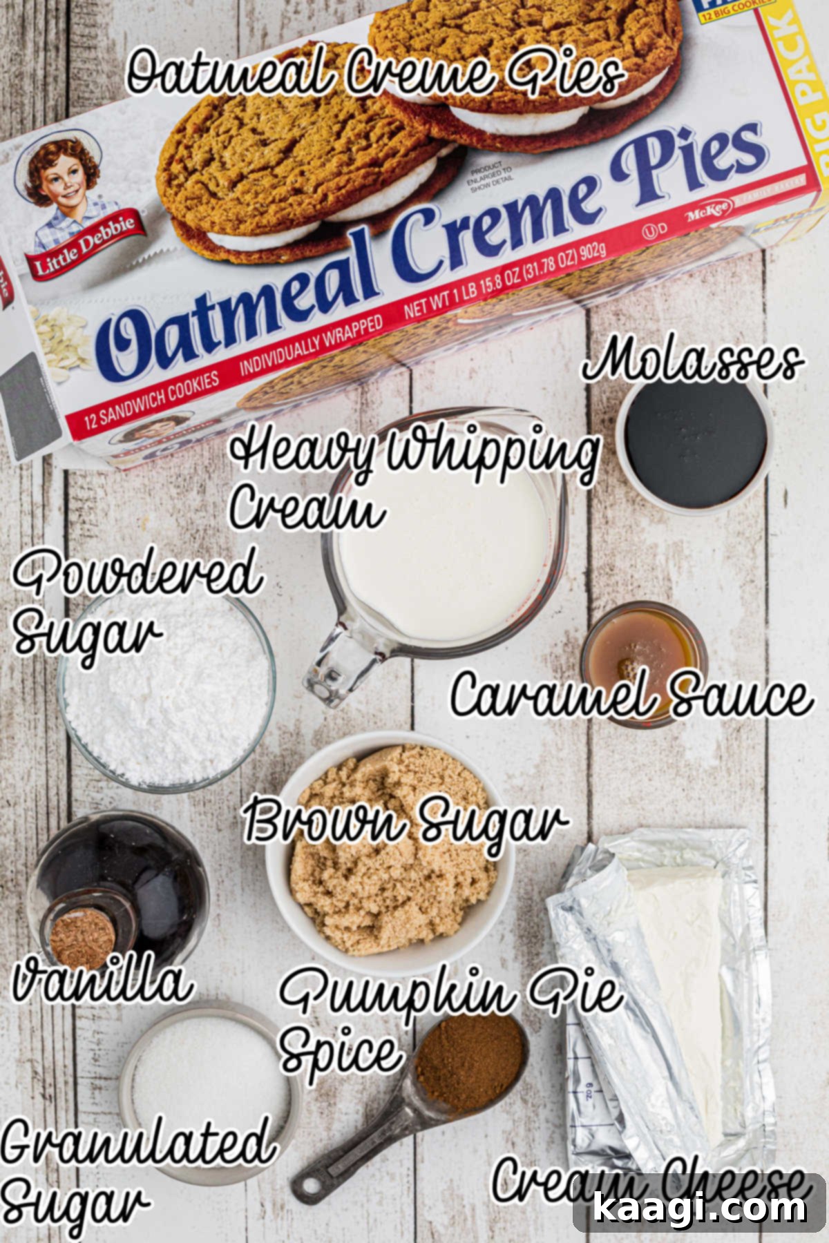A collection of ingredients laid out on a kitchen counter, ready to be used for the oatmeal creme pie cheesecake recipe.