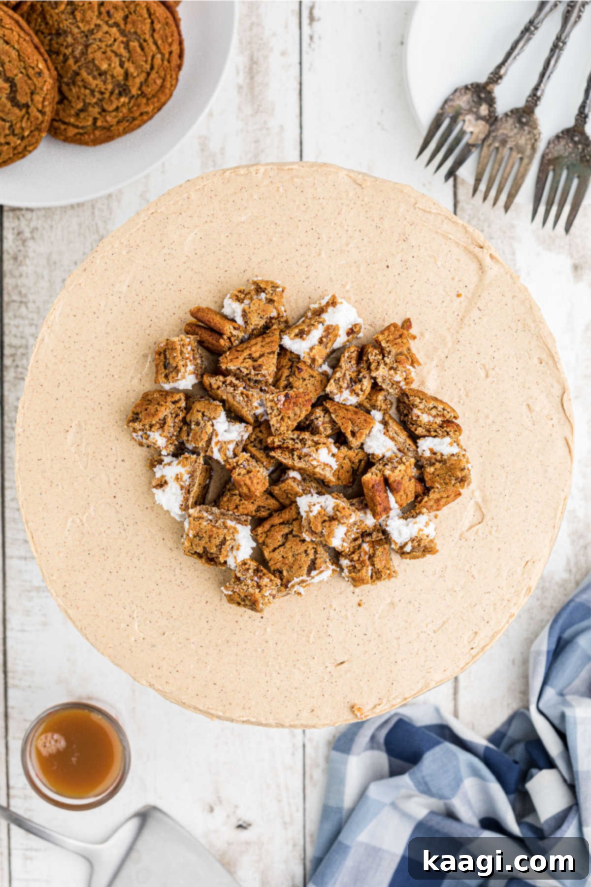 The top of an oatmeal creme pie cheesecake, beautifully decorated with chopped cookies.