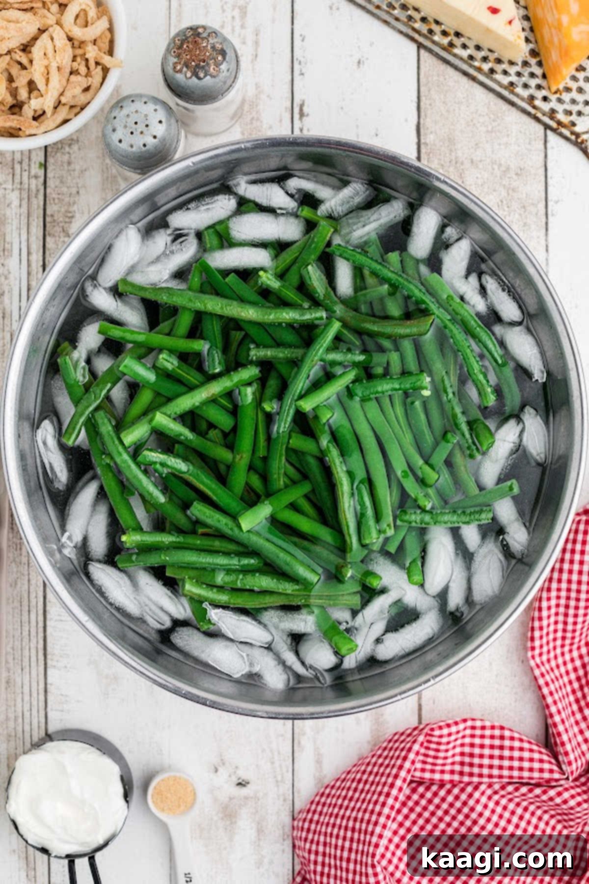 Green beans in a pot with ice.