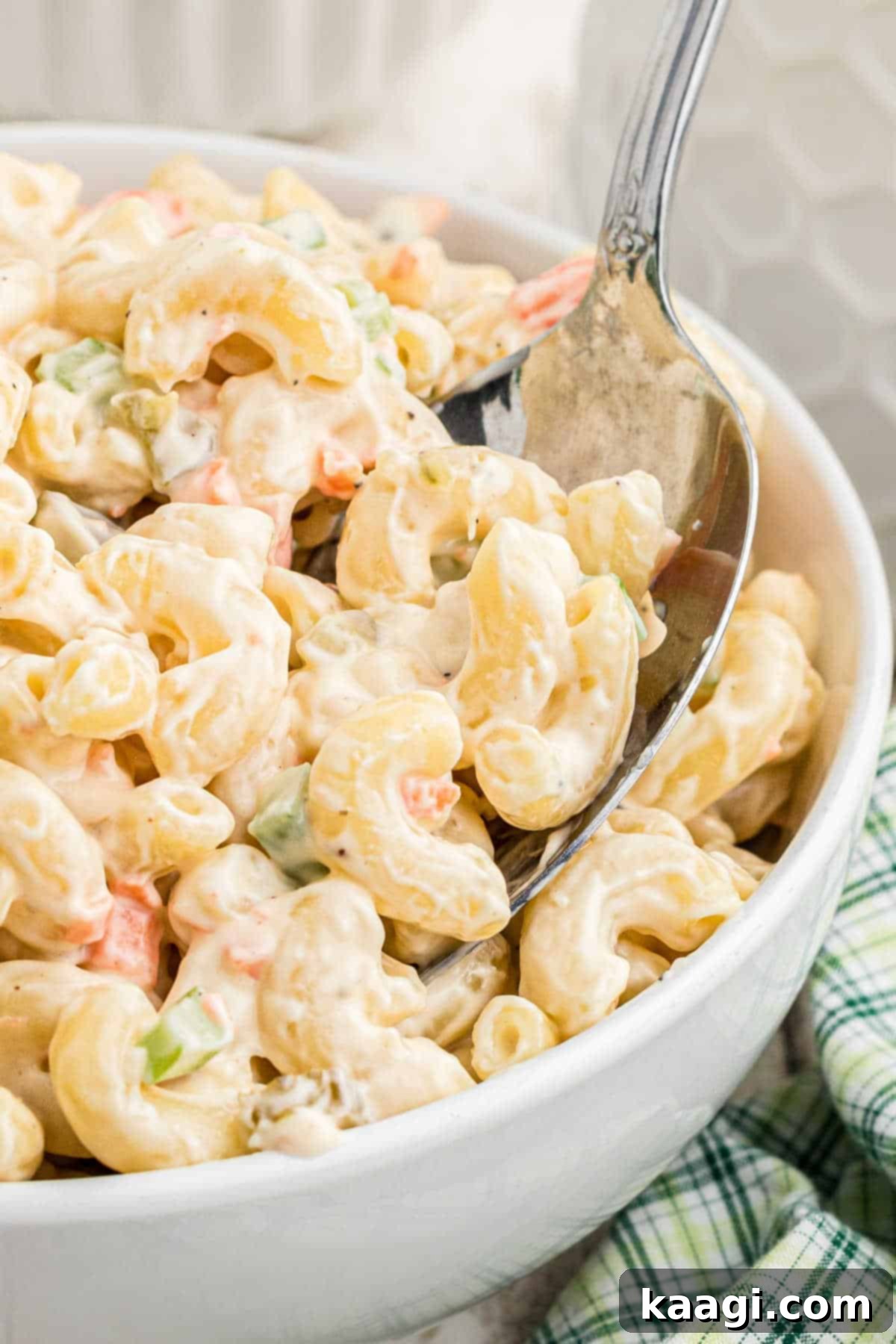 Close up of a bowl of creamy and tangy homemade KFC Macaroni Salad.