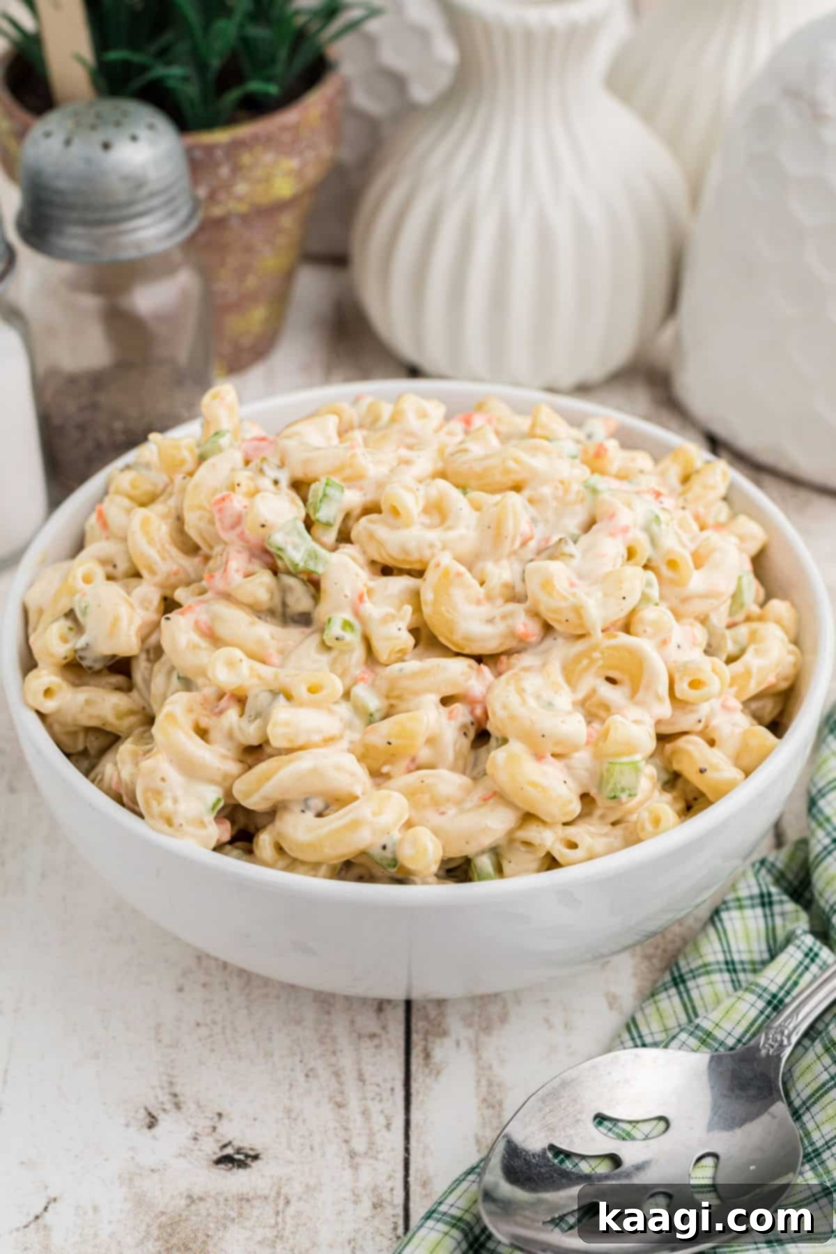 A bowl of delectable KFC Macaroni Salad Recipe, ready to be enjoyed.