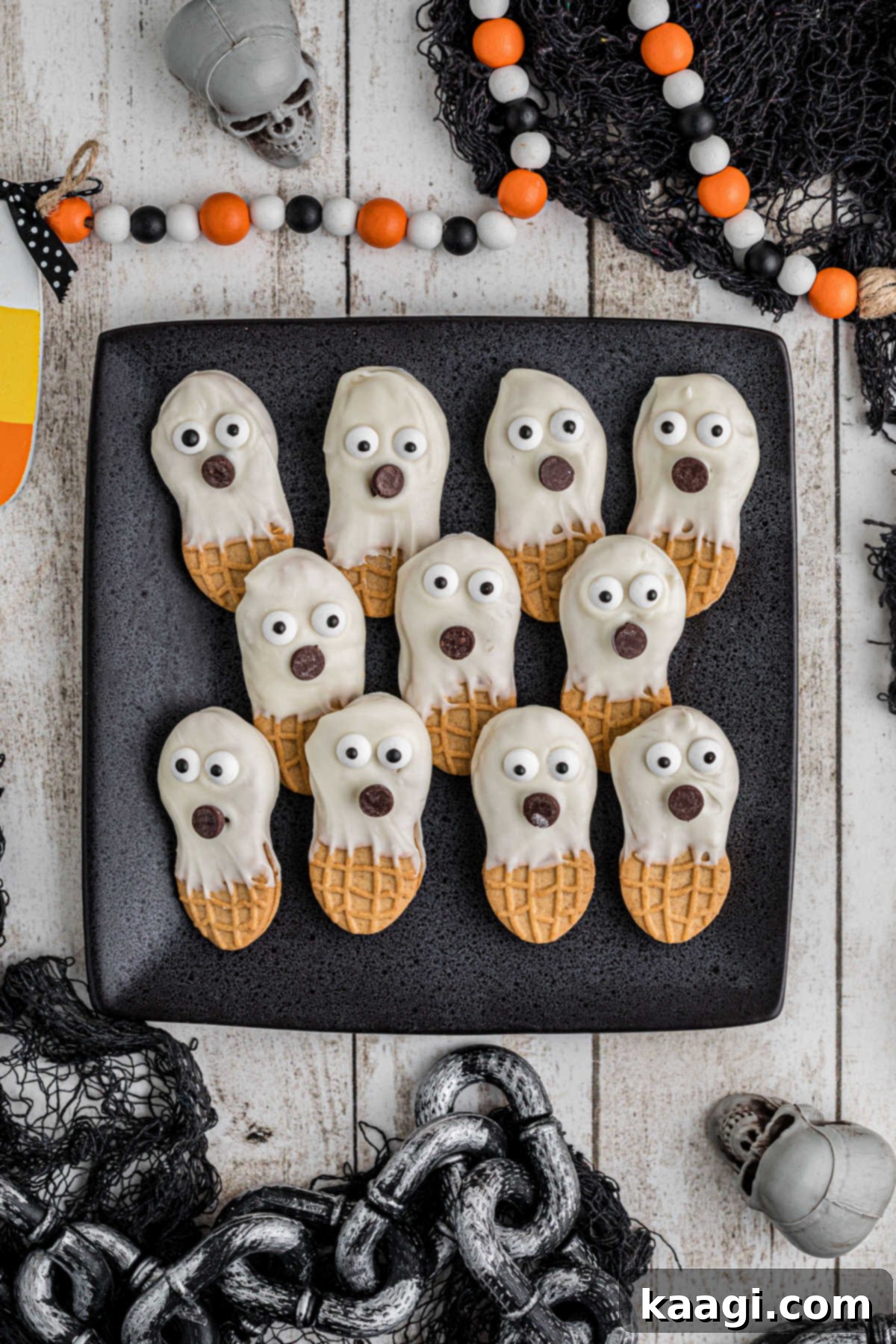 Boo-tter Bites 2 Overhead shot of a plate full of Nutter Butter Ghosts for Halloween.