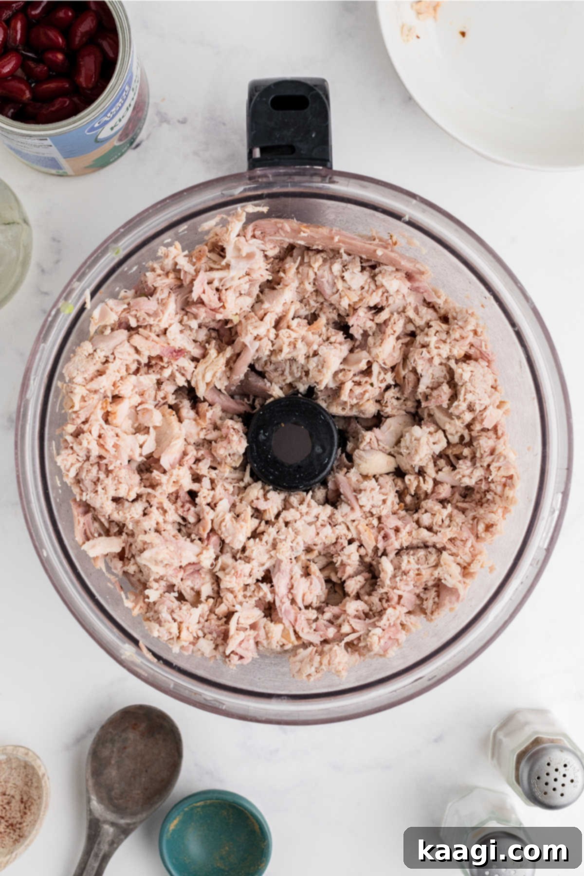 Rich and Hearty Dutch Oven Turkey Chili 6 Turkey added to a food processor and chopped up.