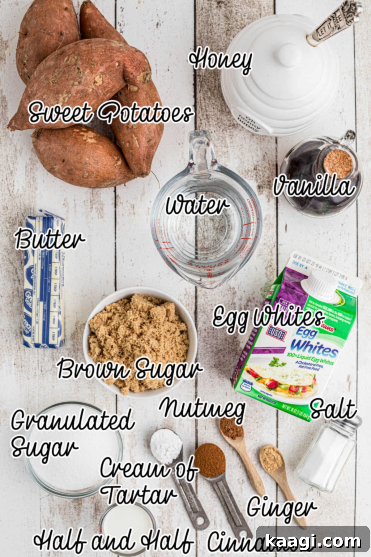 A flat lay of all the fresh ingredients required to make a sweet potato fluff, including sweet potatoes, butter, brown sugar, spices, and eggs.
