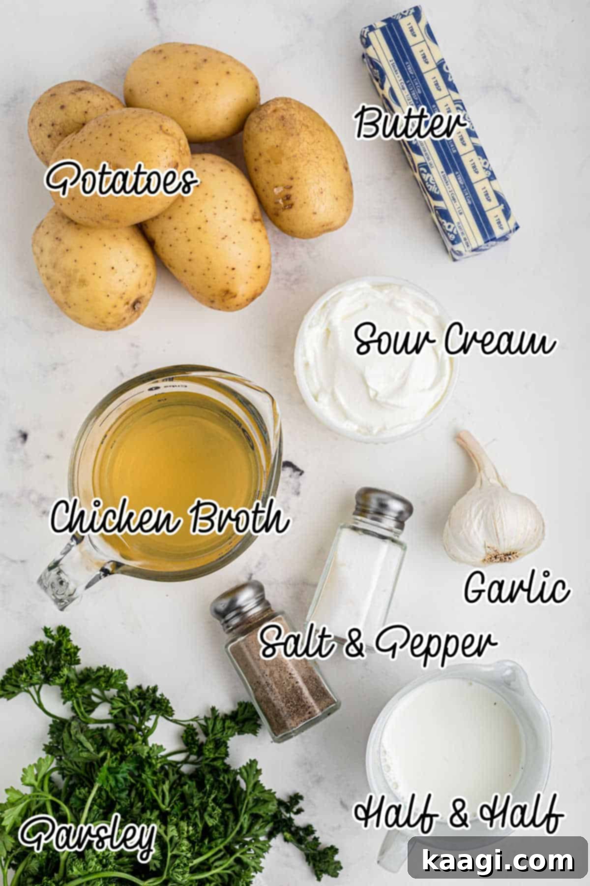 Savory Slow Cooker Mashed Potatoes 3 Overhead image of ingredients needed to make a slow cooker mashed potatoes with chicken broth recipe.
