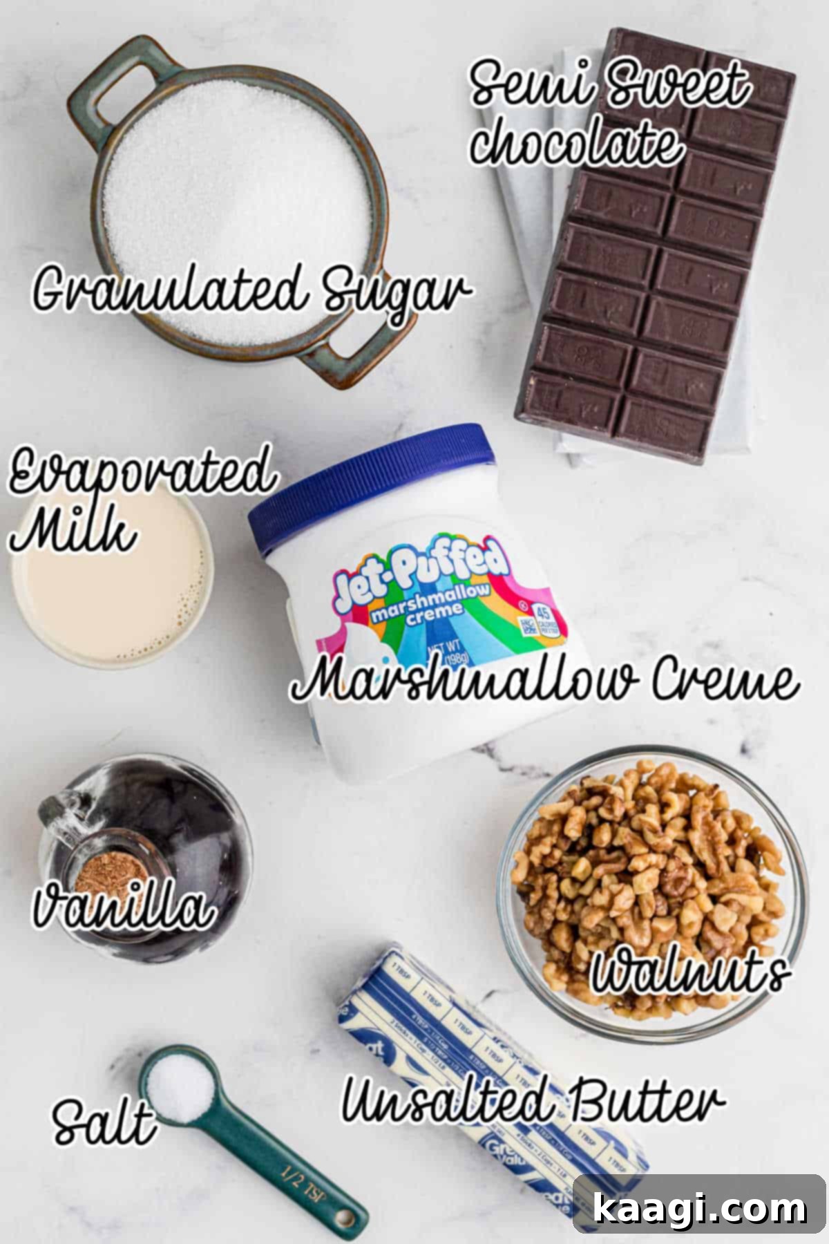 A neatly arranged collection of ingredients for Amish Fudge, including sugar, butter, evaporated milk, marshmallow creme, chocolate, vanilla, and walnuts.