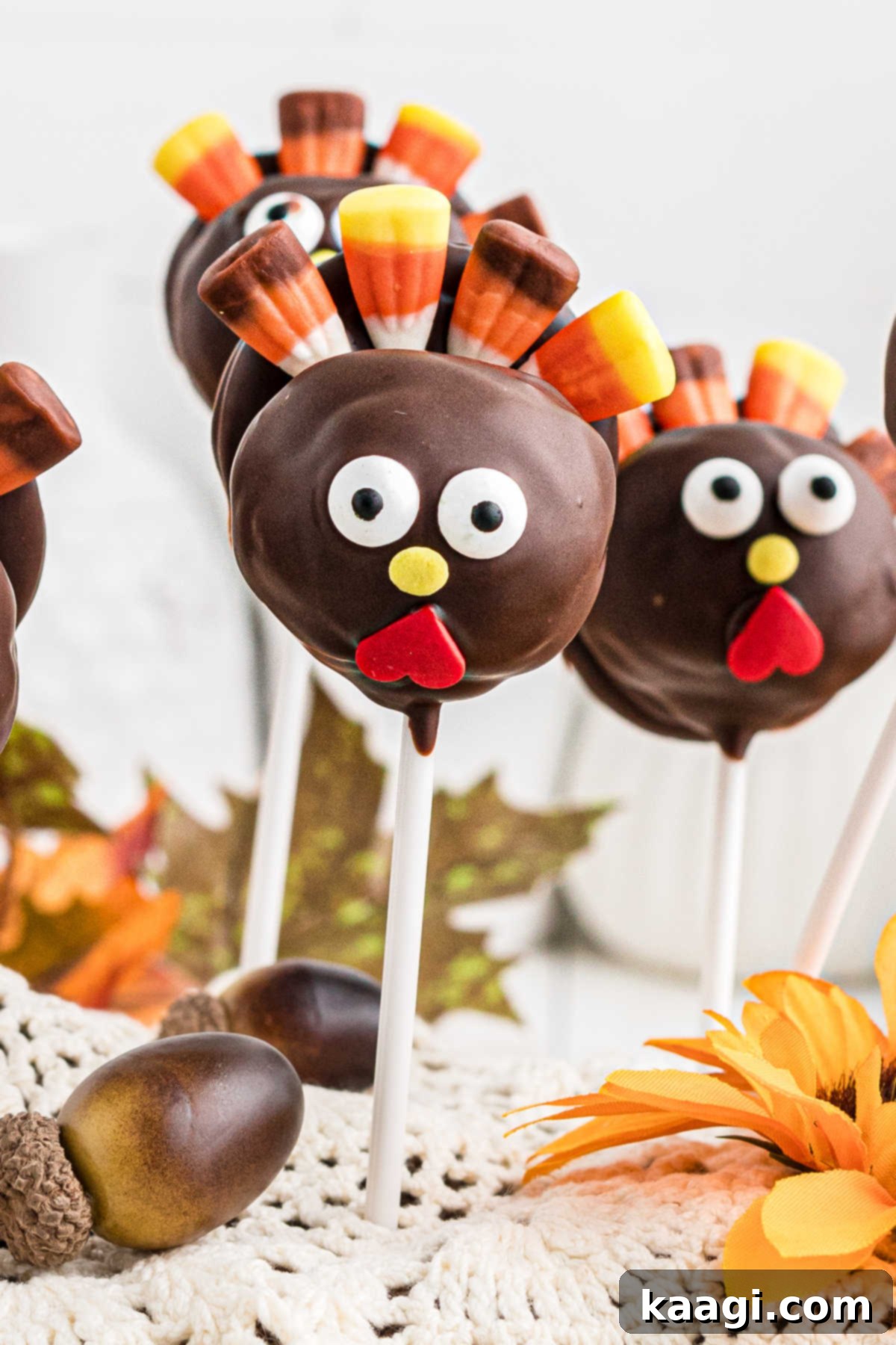Festive Thanksgiving Cake Pops 9 A charming close-up of a perfectly decorated Thanksgiving cake pop, lovingly crafted into the shape of a turkey.