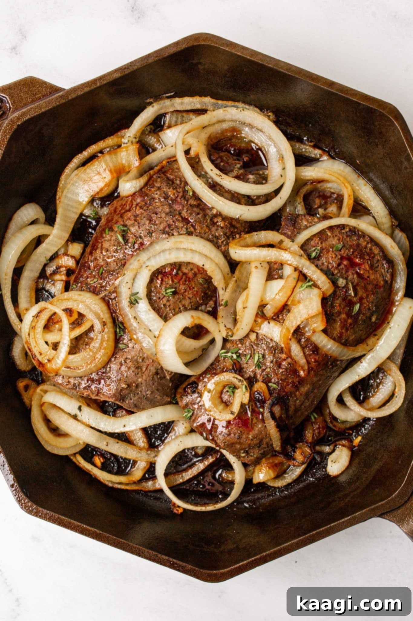 Southern Skillet Classics 18 A succulent, perfectly cooked venison backstrap, known for its tender texture, served fresh from the cast iron.