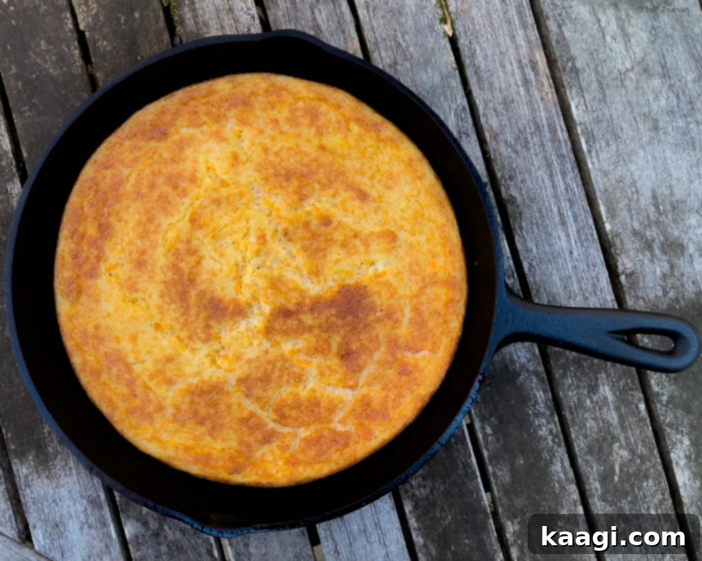 Southern Skillet Classics 42 Sweet Potato Grits Spoonbread, a light and fluffy dish that resembles cornbread but has a unique texture.