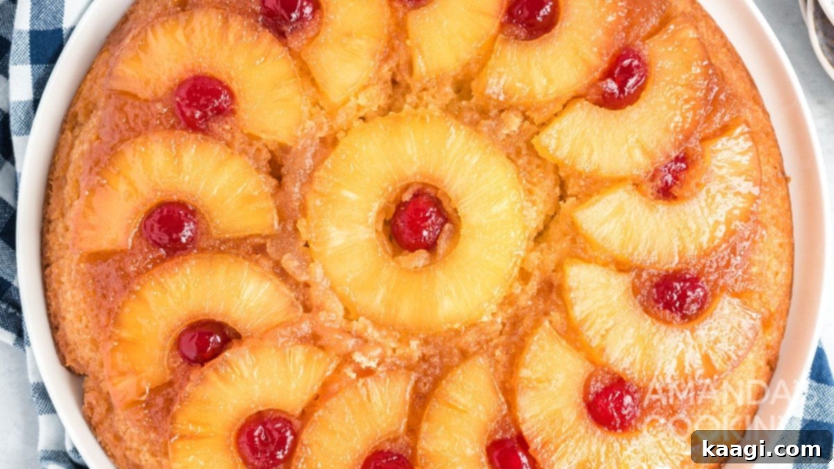 Southern Skillet Classics 49 A vibrant Cast Iron Skillet Pineapple Upside Down Cake, showcasing its caramelized brown sugar and butter topping.