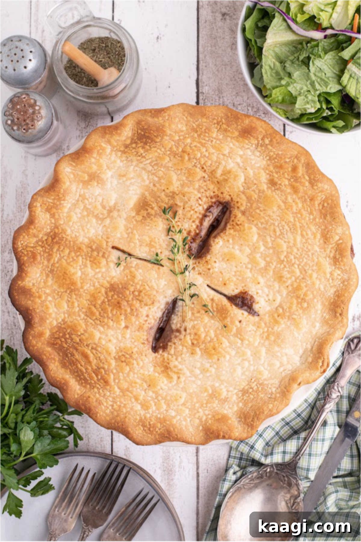 A cooked beef pot pie, nicely browned.