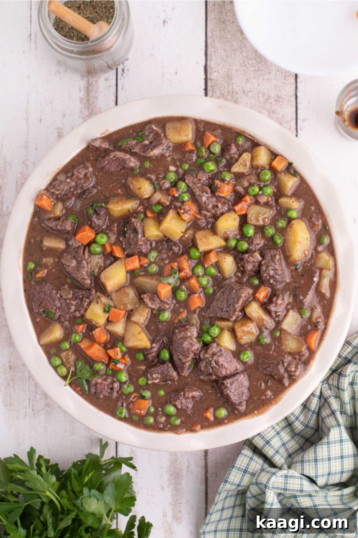 Beef pot pie filling in a large deep dish pie dish.