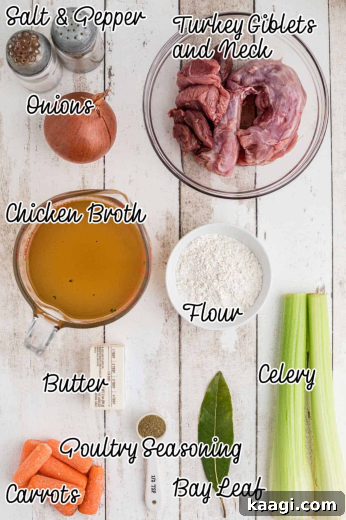 Overhead shot of ingredients needed to make a southern giblet gravy recipe with text overlay, including fresh vegetables, butter, and giblets.