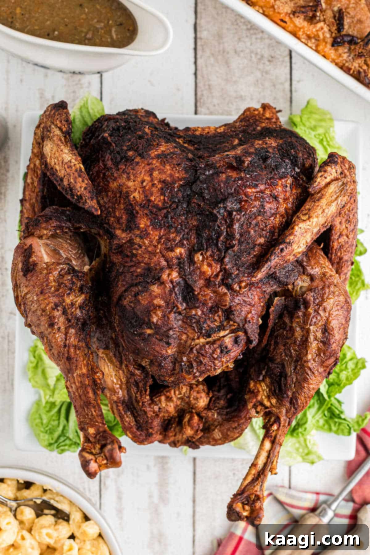 Crisp and Juicy Turkey Triumph 2 Overhead shot of a perfectly deep fried turkey, golden brown and ready to be carved.