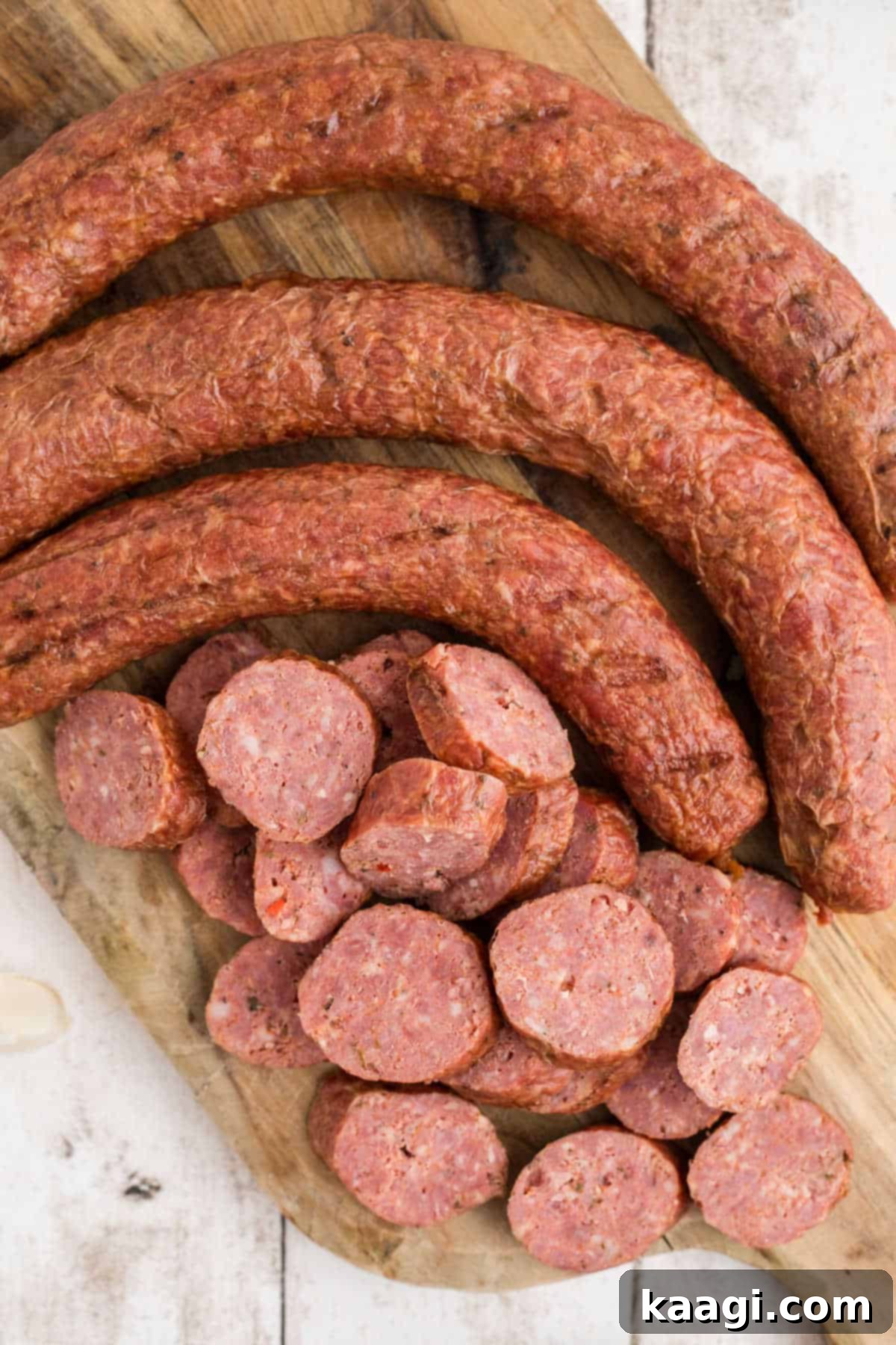 Overhead shot of some andouille sausage, with some sliced into coins.