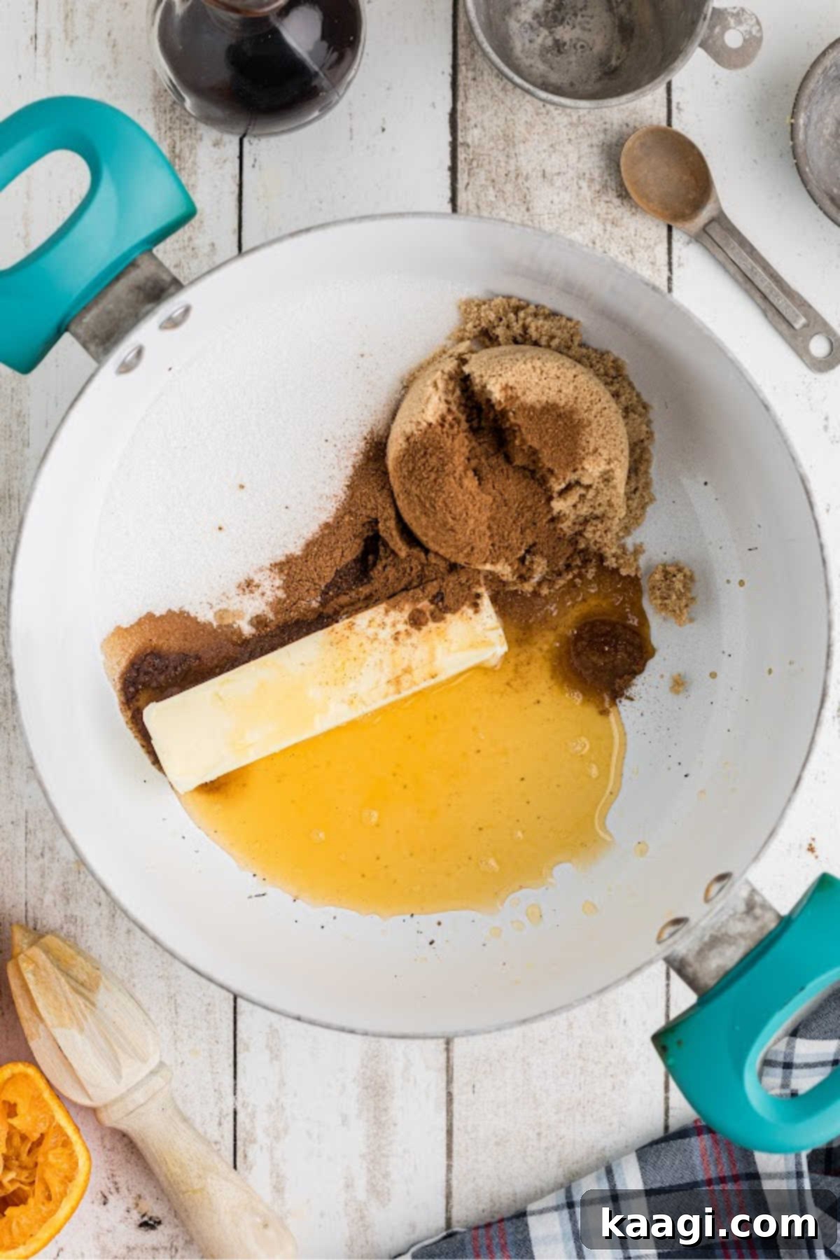 A pot with some butter melting with sugar.