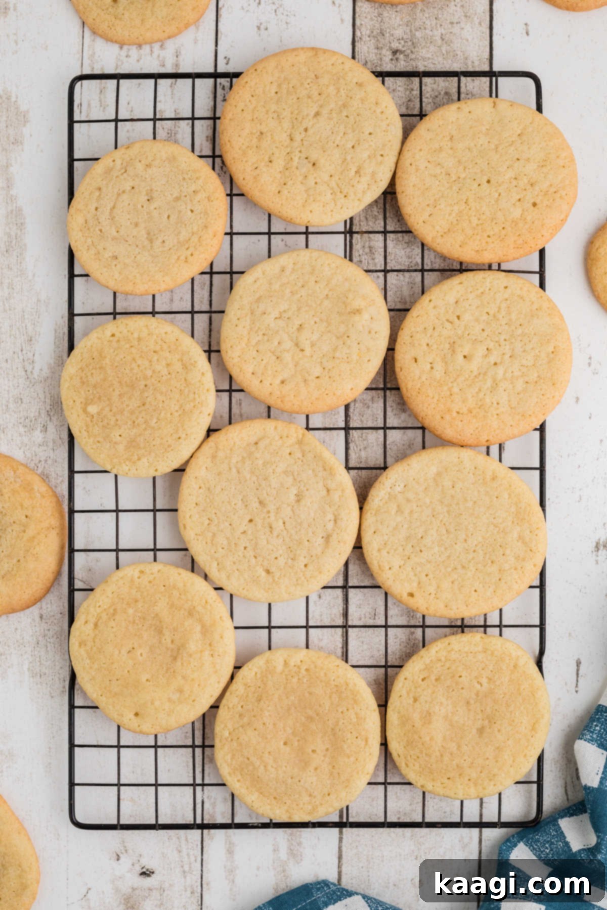 A cooling rack with some old fashioned tea cakes, cooling down after baking.