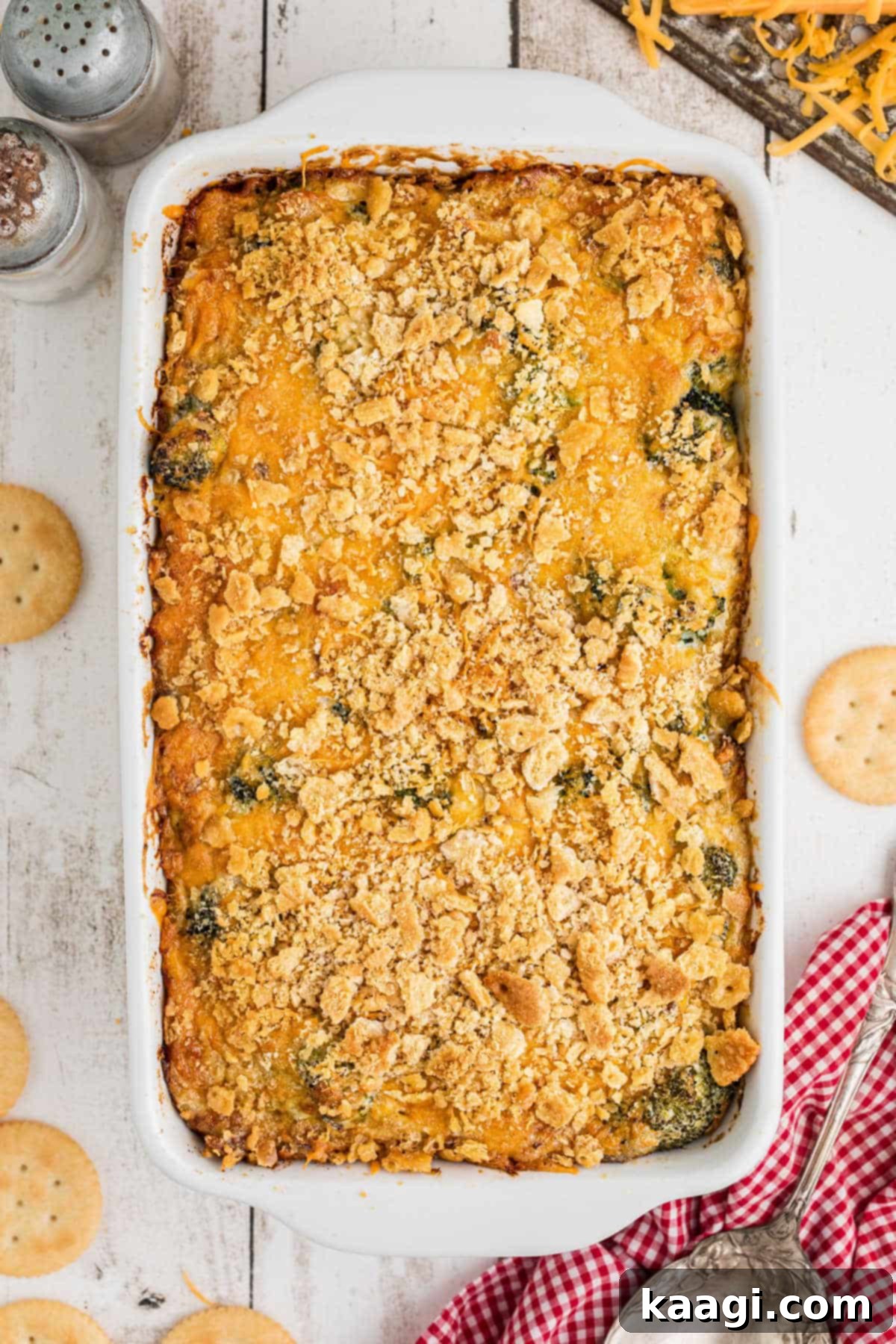 Golden Broccoli Bake 11 An inviting overhead shot of a golden-brown broccoli casserole baked to perfection in a rectangular dish, with a crispy, crumbly topping.