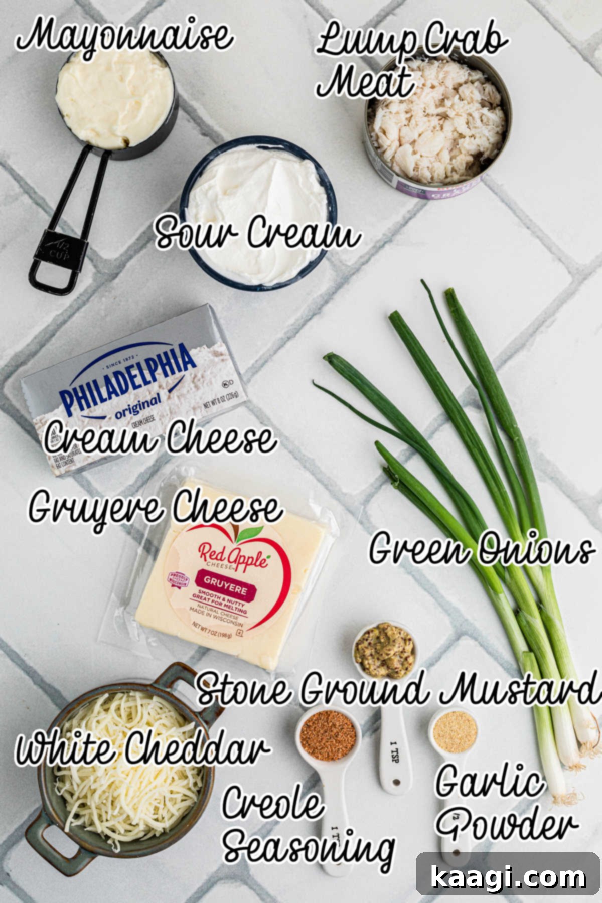 Ingredients needed to make a hot crab dip in the slow cooker, neatly arranged.