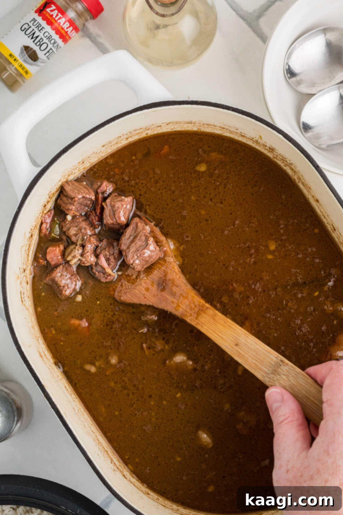 Soulful Southern Beef Gumbo 11 A large pot of beef gumbo slowly cooking.