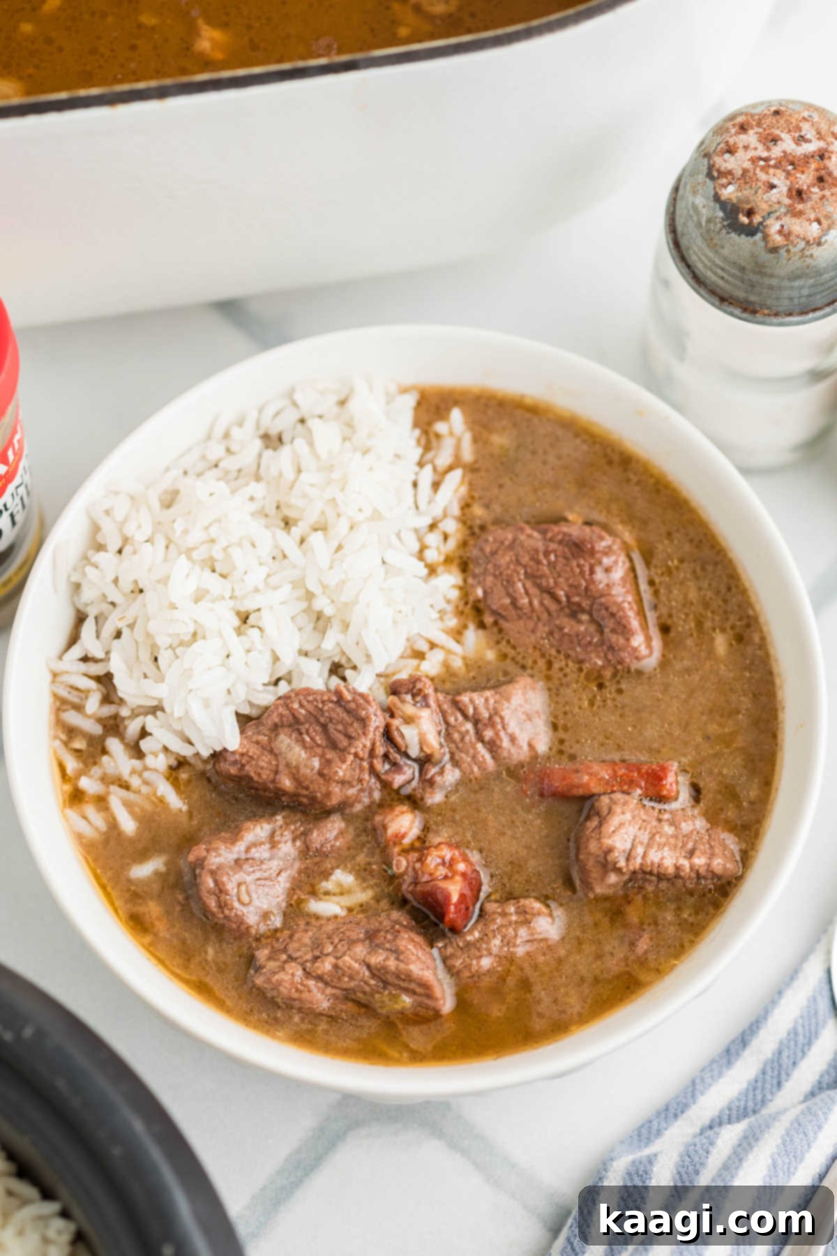 Soulful Southern Beef Gumbo 12 A bowl full of beef gumbo with rice.