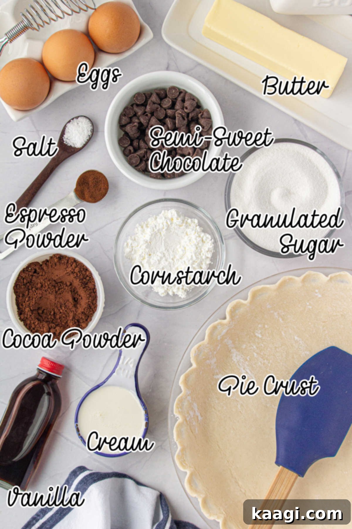 A flat lay image displaying all the simple, high-quality ingredients needed to prepare a delicious Southern Chocolate Chess Pie.