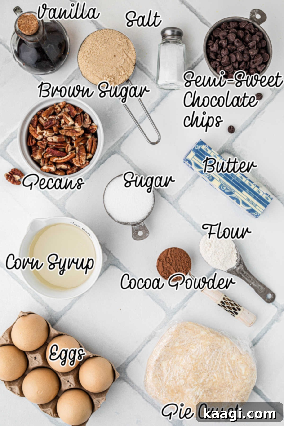 A curated selection of fresh ingredients laid out for baking a homemade chocolate pecan pie, including pecans, chocolate chips, eggs, flour, butter, and corn syrup.