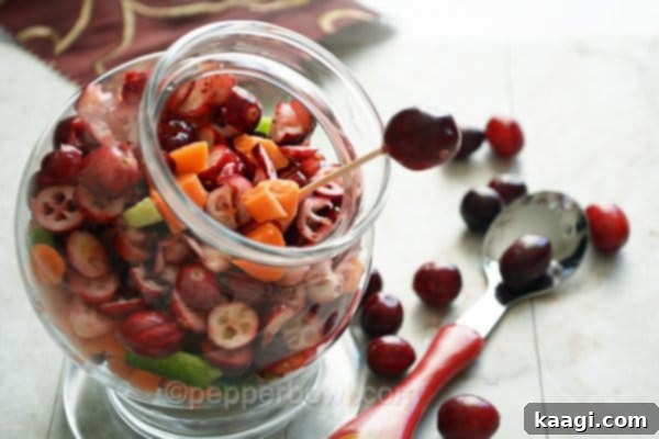 A vibrant cranberry salad with carrots, a fresh addition to Thanksgiving dinner.