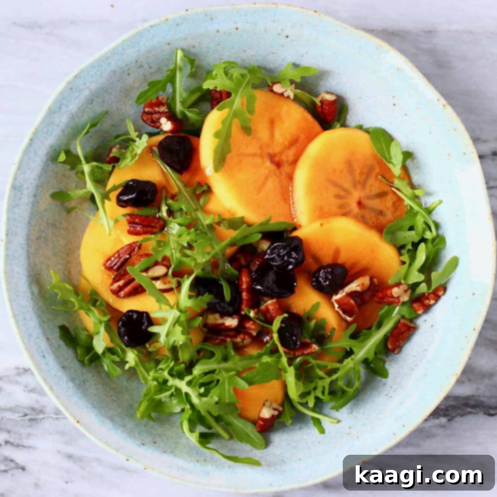 A beautifully colorful and festive Persimmon Salad, naturally vegan and gluten-free.