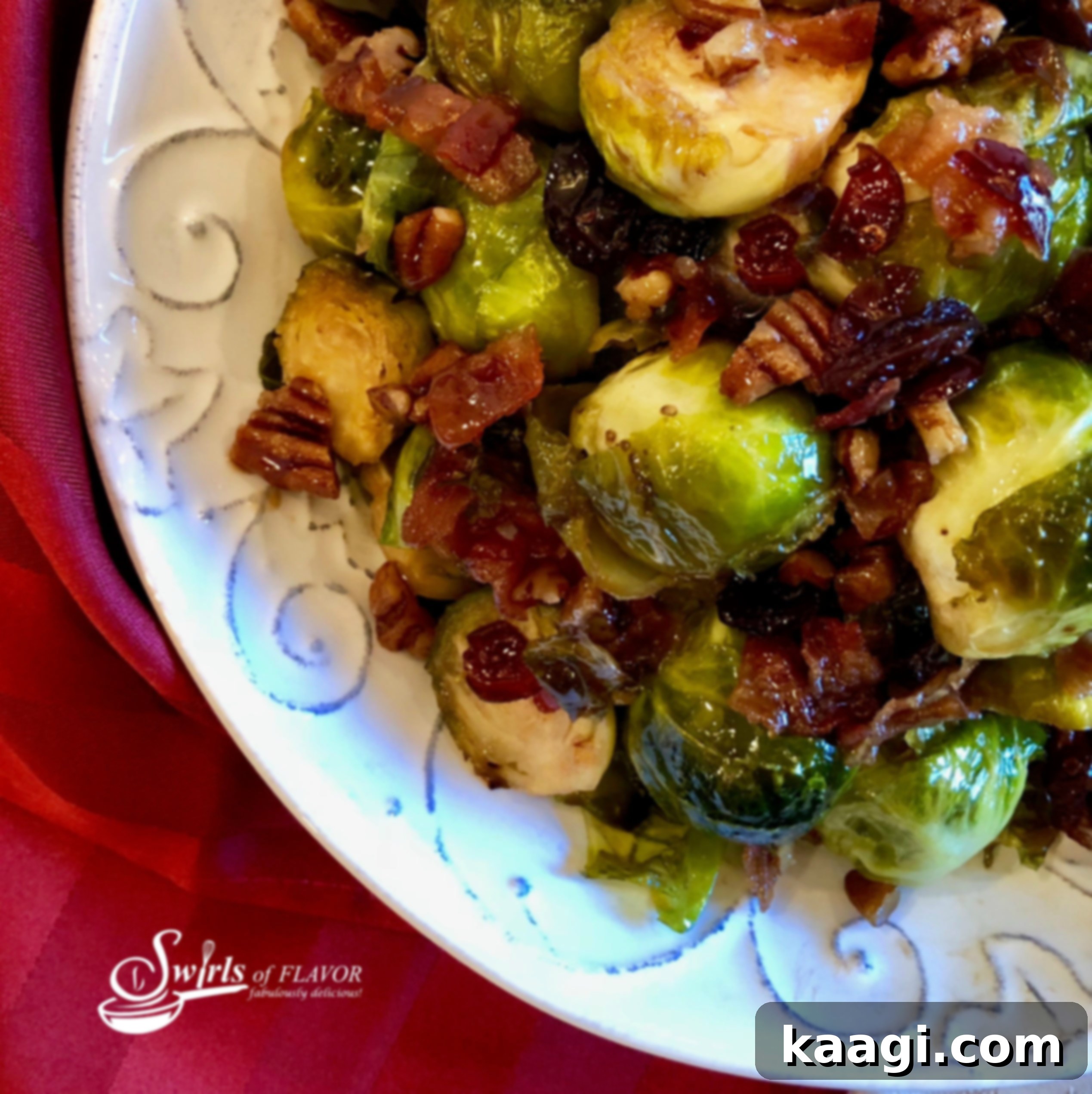 Colorful plate of Brown Sugar Brussels Sprouts with Bacon and Cranberries.