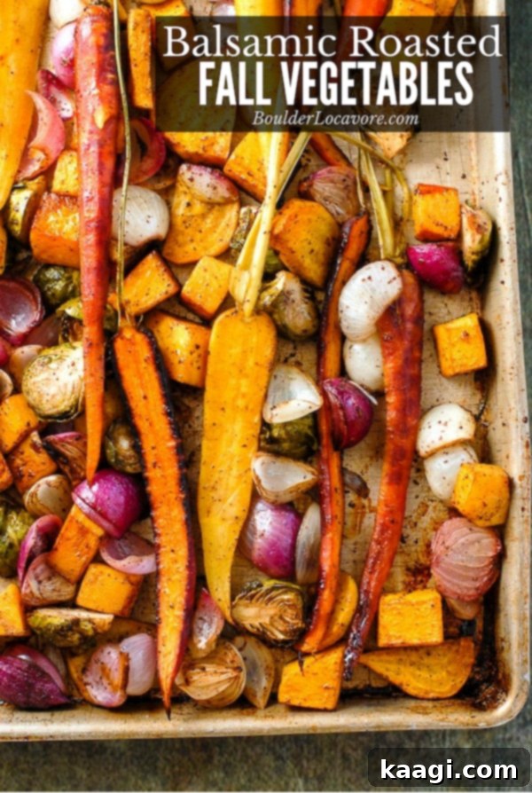Beautifully arranged balsamic roasted fall vegetables with sumac, showcasing autumnal colors.