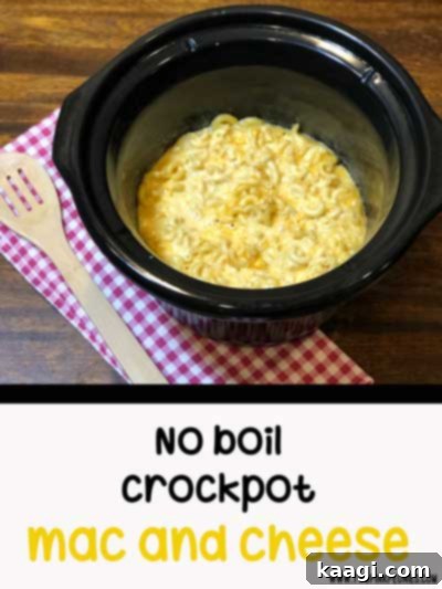 Creamy no boil crockpot mac and cheese, perfectly cooked and ready to scoop.