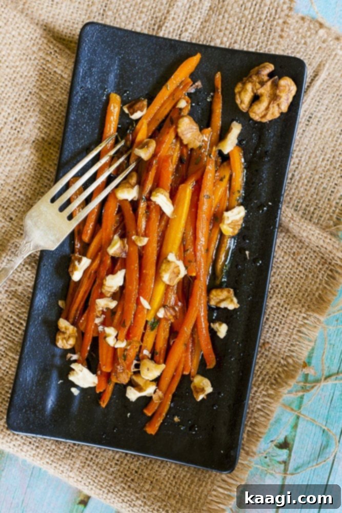 Elegant julienne carrots sautéed in a rich maple thyme glaze, ready to impress.