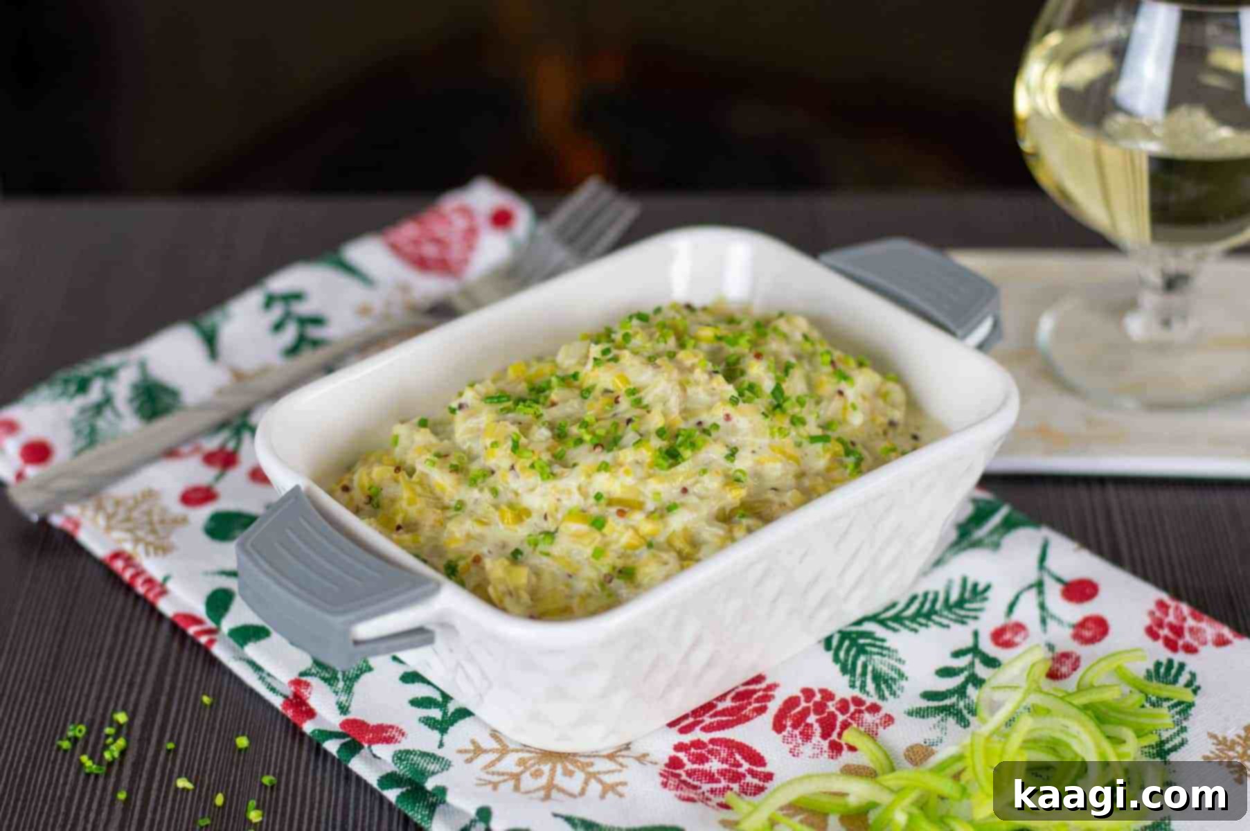 Rich and creamy leeks in a serving dish, a simple yet elegant side.