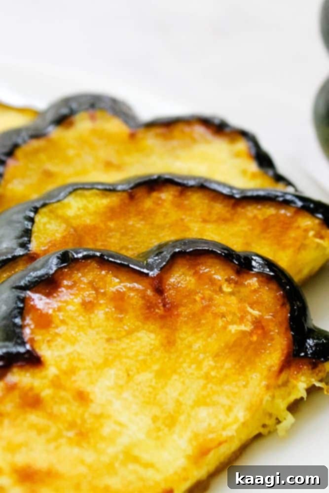 Perfectly roasted maple acorn squash slices, beautifully caramelized.