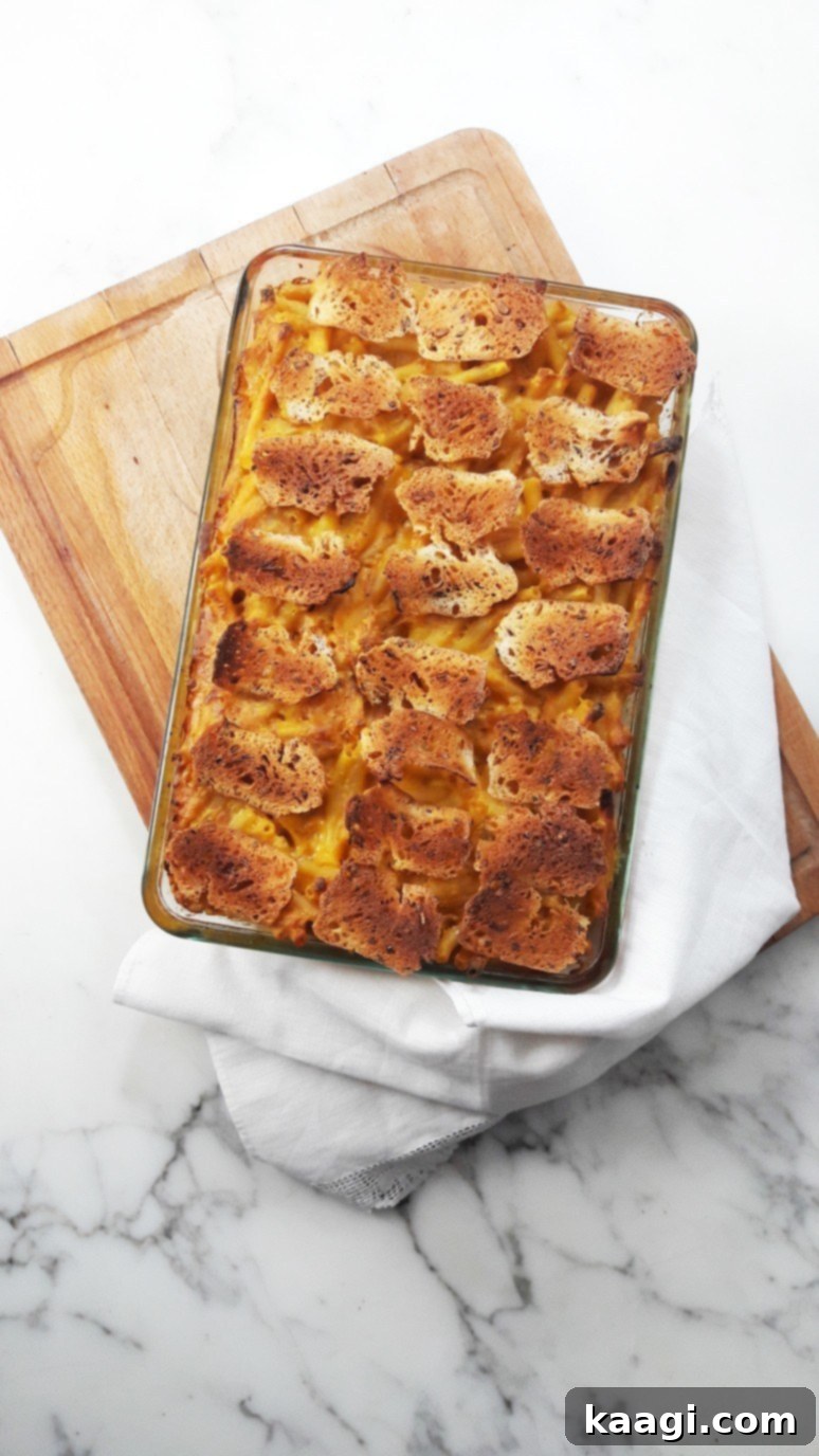 Creamy, vibrant pumpkin mac and cheese, comfort food at its finest.