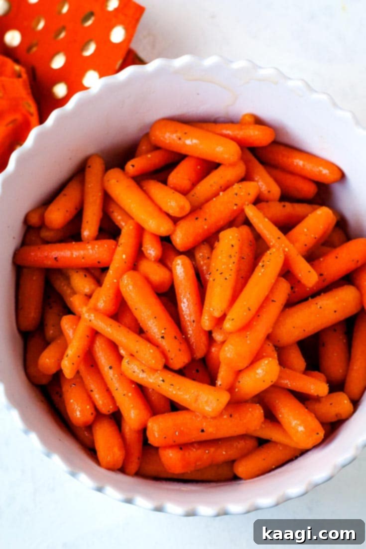 Sweet and tender brown sugar glazed carrots in a serving bowl.