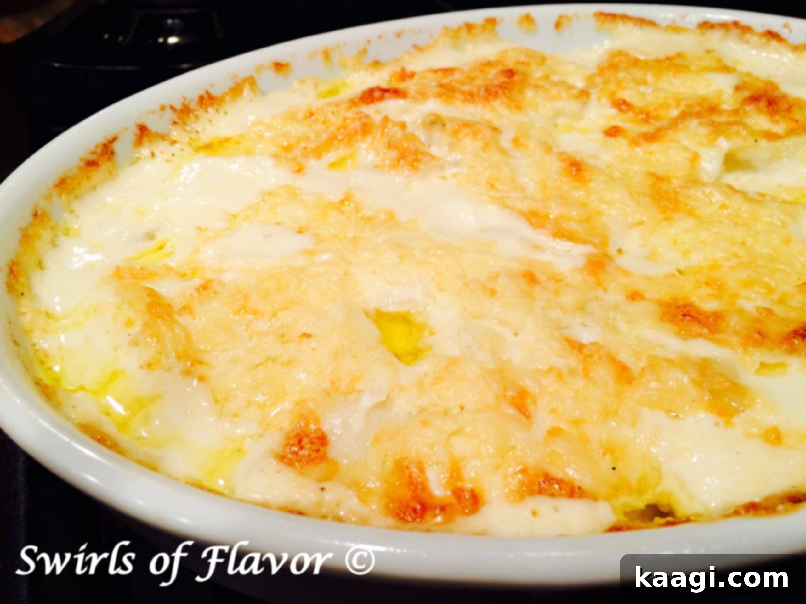 A luxurious potatoes au gratin casserole, cheesy and golden brown.