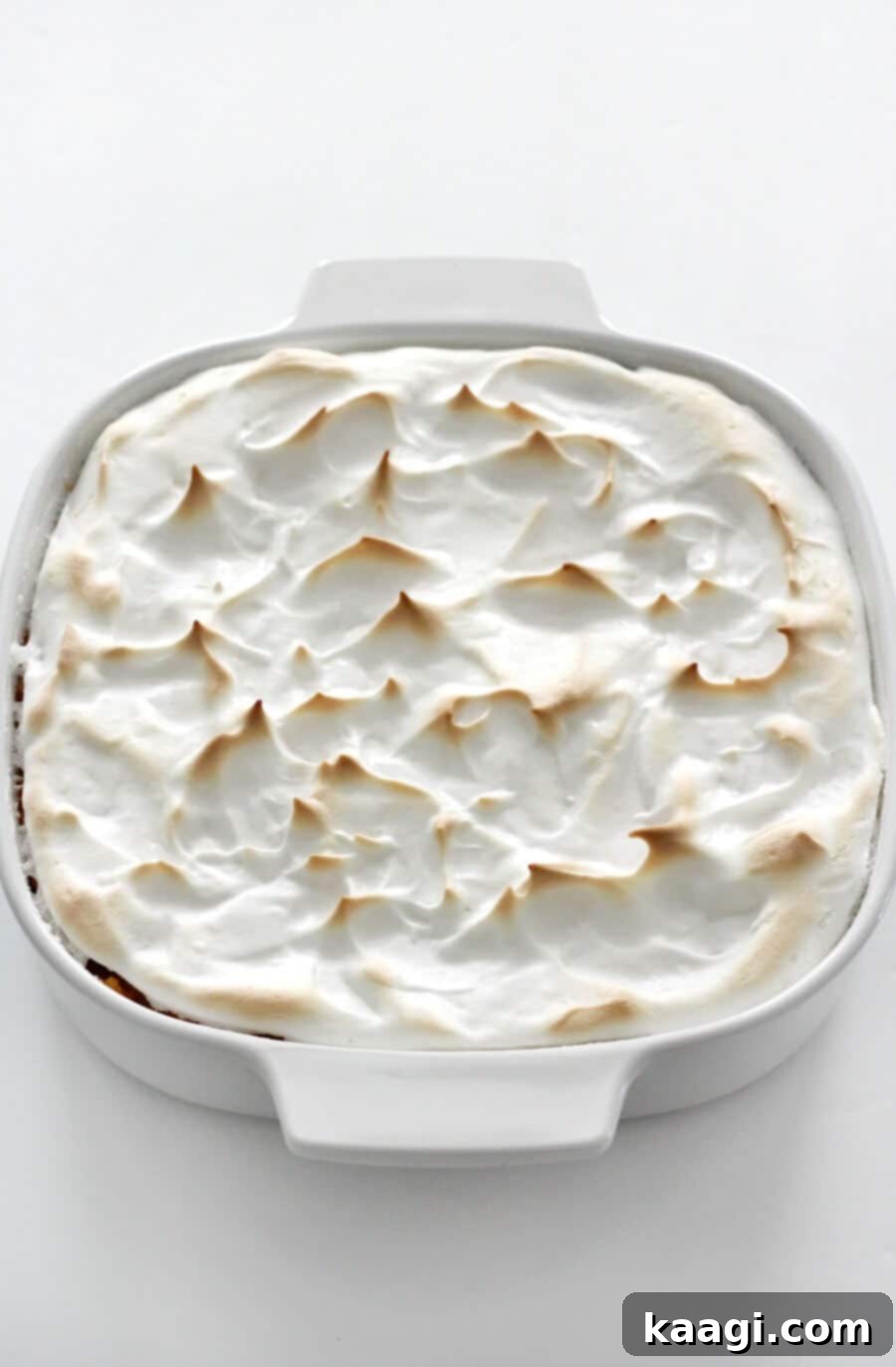 A beautiful vegan sweet potato casserole with a fluffy marshmallow topping.