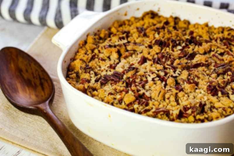 A delightful sweet potato casserole crowned with a crunchy praline topping.