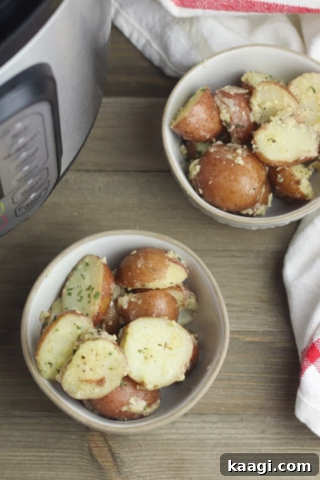 Golden Instant Pot roasted potatoes with a crispy parmesan crust.