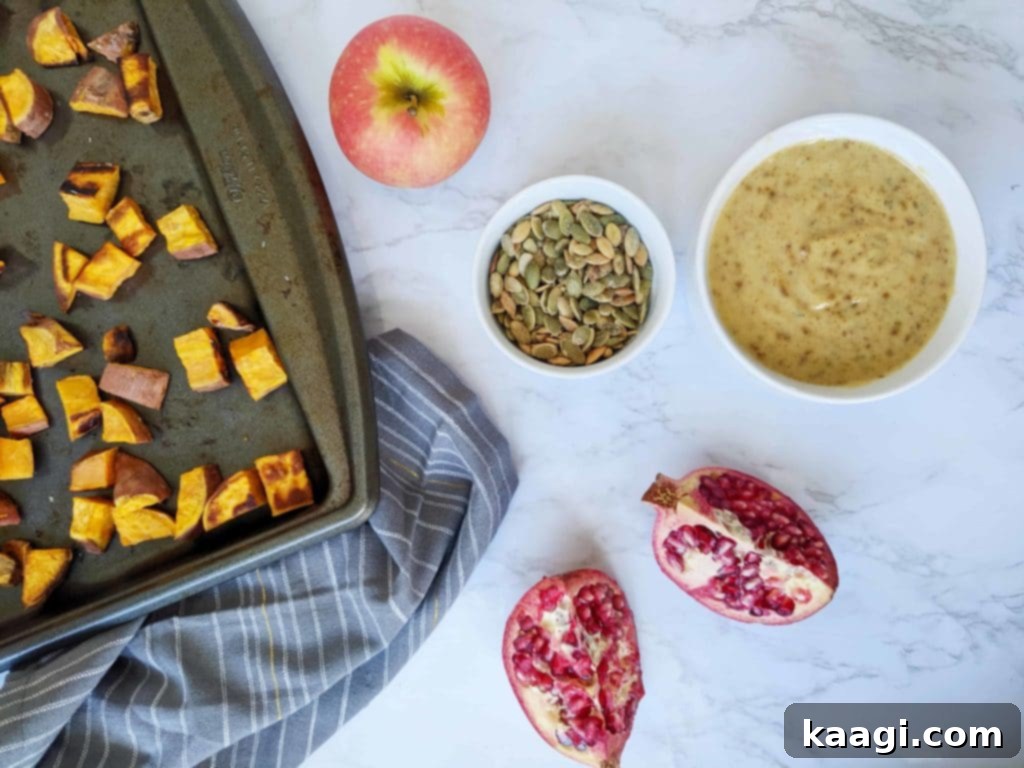 A colorful Fall Cobb Salad, brimming with seasonal flavors and textures.