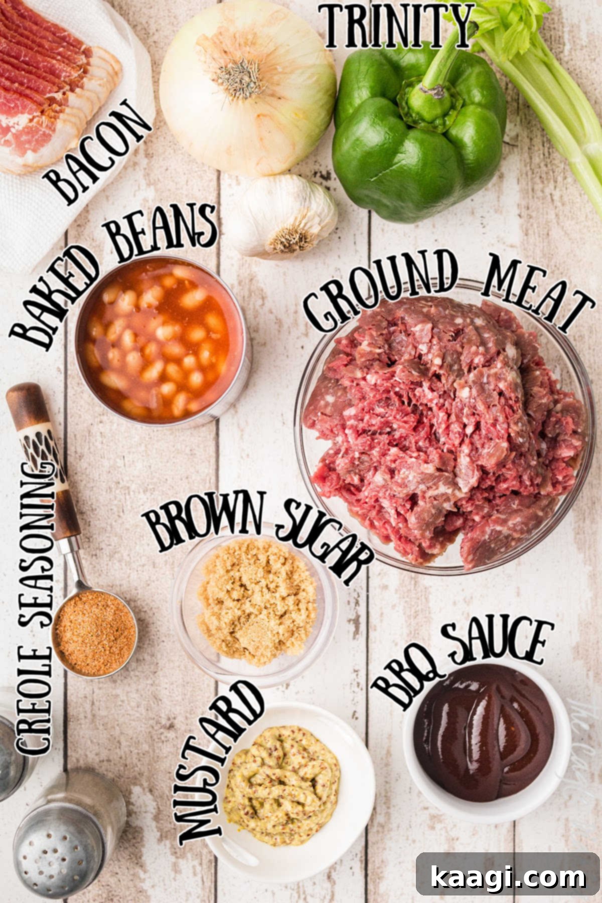 Soulful Southern Baked Beans 3 A selection of ingredients for baked beans, including cans of pork and beans, fresh onions, bell peppers, celery, ground meat, and various sauces and seasonings.