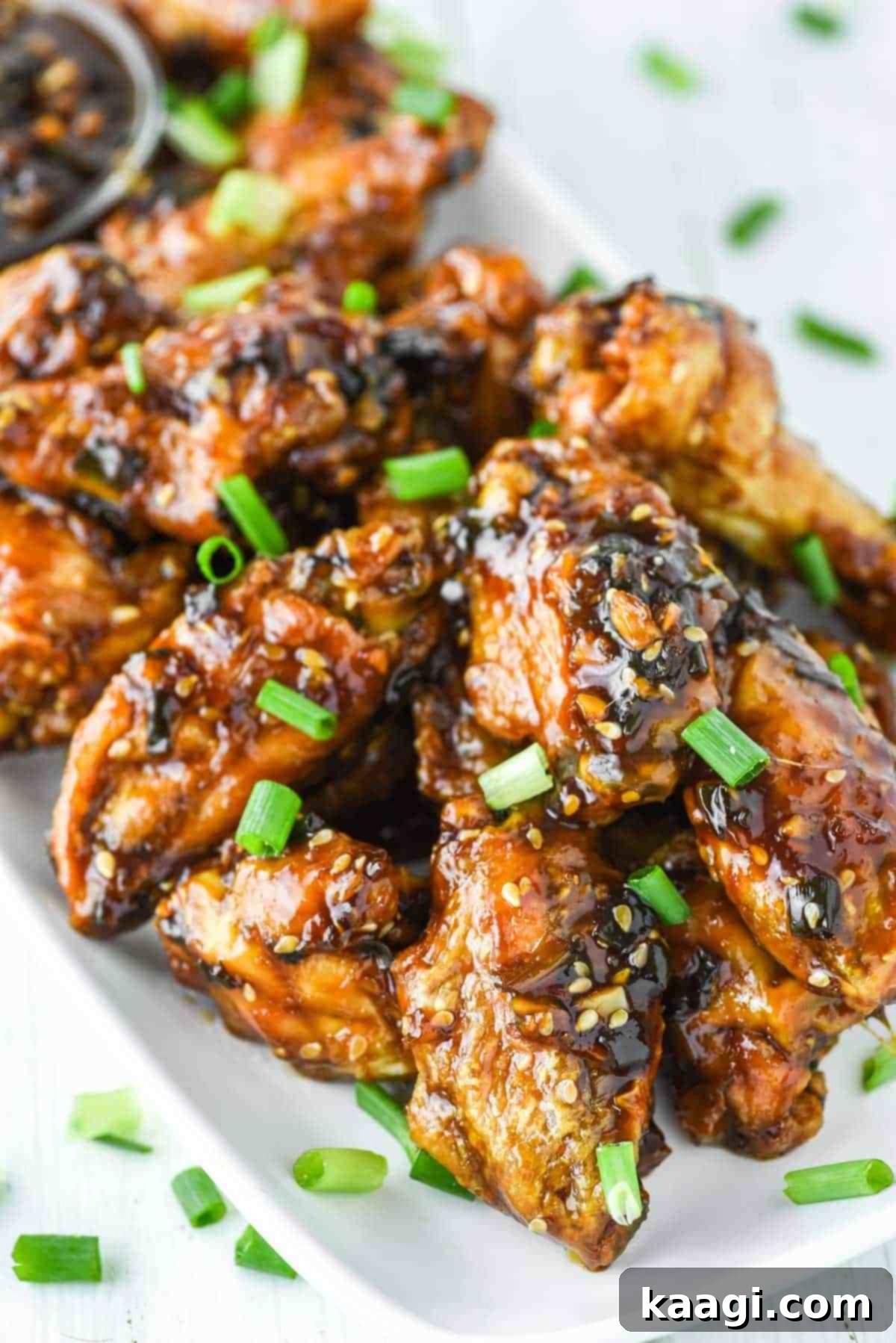 Baked Teriyaki Chicken Wings, glistening with a savory glaze, a healthier yet equally delicious alternative to fried wings.